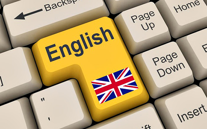 Un tasto “inglese” sulla tastiera di un computer che implica una traduzione istantanea.